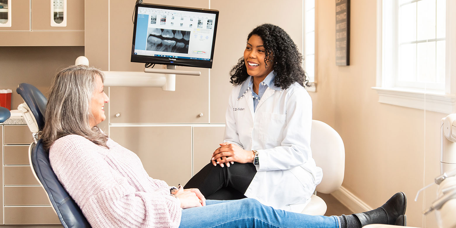 Dr. Ria C. Sahara with a Patient.